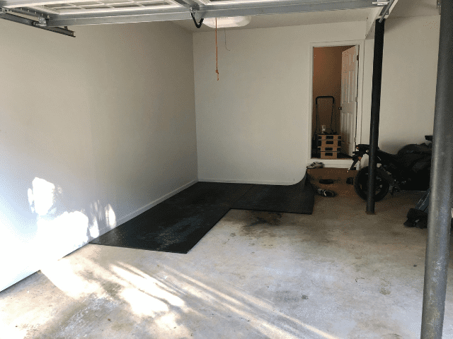 Gym Flooring Being Installed In Garage