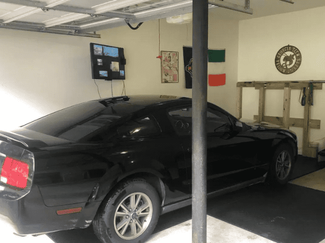 Car Parked Inside Garage Gym