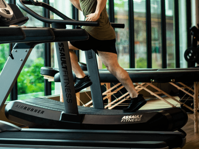 Man Running on Manual Treadmill