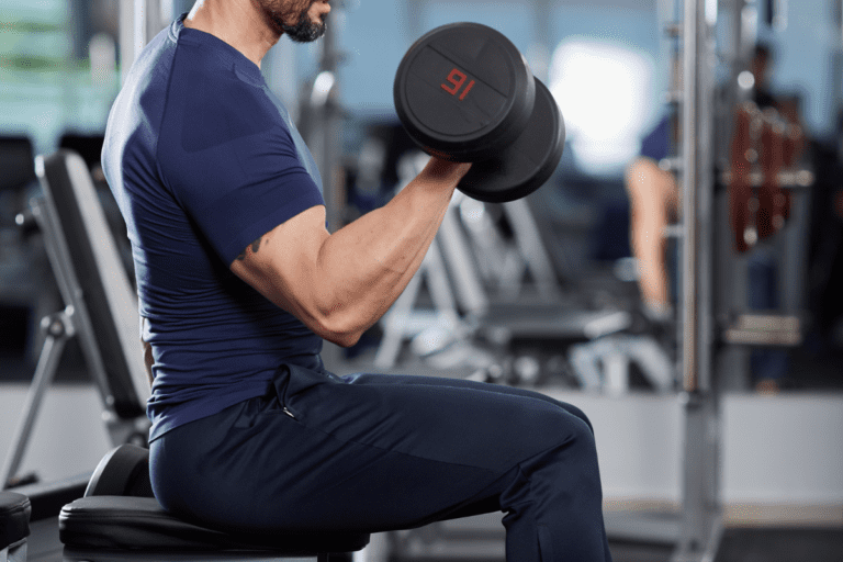 Seated Dumbbell Curls (How To, Muscles Worked, Benefits)