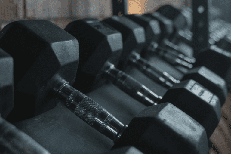Kneeling Single-Arm Dumbbell Press (How To, Muscles Worked)