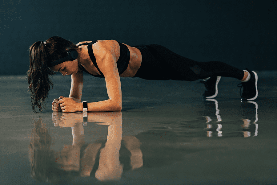 Female Athlete doing Planks